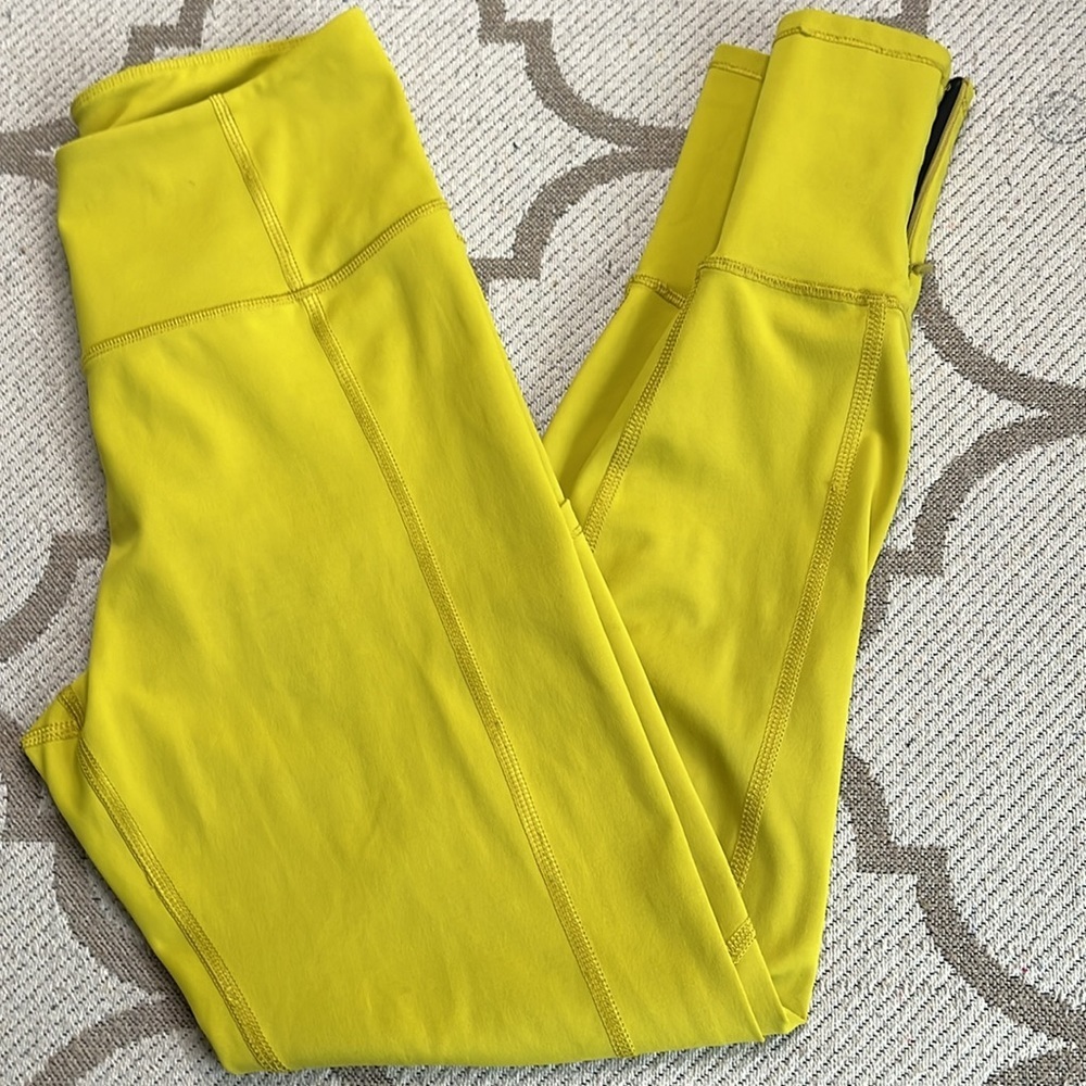 Thrive Societe mustard yellow side pocket zipper ankle leggings